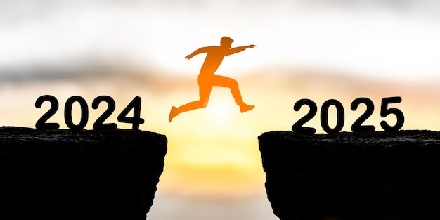 Silhouette of leap from 2024 to 2025 symbolizing progress and hope | Premium AI-generated image